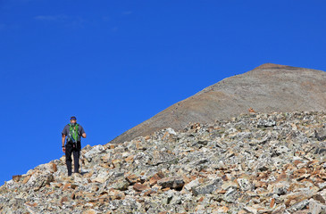 Hiker heads toward the summit of Colorado's 14,000-foot Quandary Peak near Breckenridge