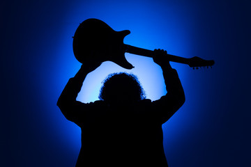 Shadow of a musician on stage