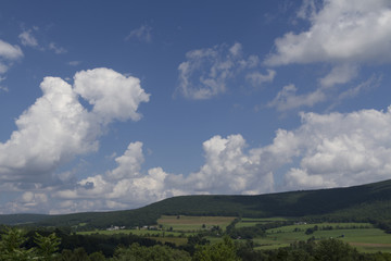 Summer Clouds Drifting Over Pennsylvania Farmland Landscape