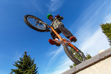 professional BMX rider made tricks on bicycle 