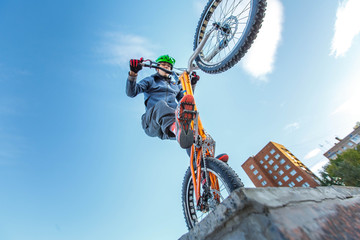 professional BMX rider made tricks on bicycle 