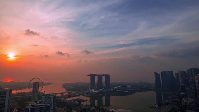 Fantastic time lapse video with sunrise at Singapore.