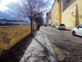 cobblestone street of Prague in Czech Republic on a cloudy day in December