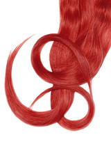 Swirled red hair on white background