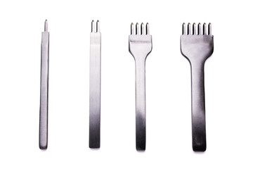 白バックの4本の菱目打ち