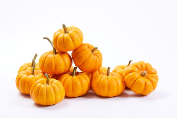 fresh pumpkins on white