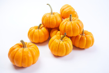 fresh pumpkins on white