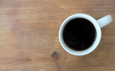 Fototapeta na wymiar Cup of coffee. Top view with copy space.