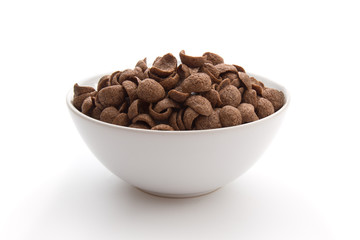 Chocolate cereals in white bowl isolated on white background.