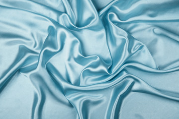 Blue luxury satin fabric texture for background