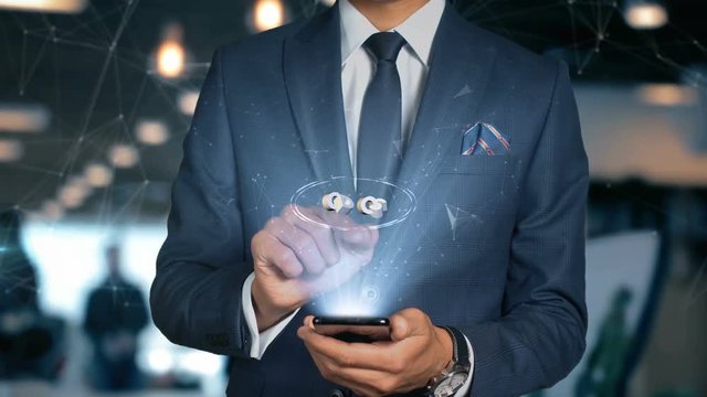 Businessman With Mobile Phone Opens Hologram HUD Interface and Touches Word - CDOS
