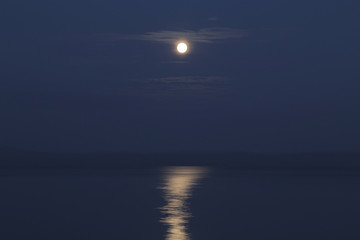 Fototapeta na wymiar Lunar path on the sea water. Moonlight. Nature landscape.