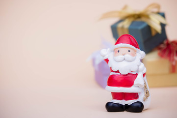 santa claus doll christmas background and gift box and copy space