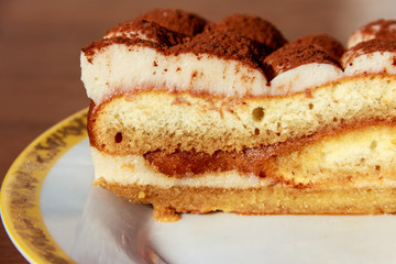 Traditional italian dessert tiramisu on a table
