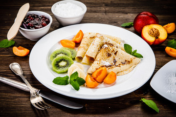 Crepes with fruits and creme 