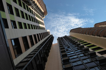 The sky is above tall buildings
