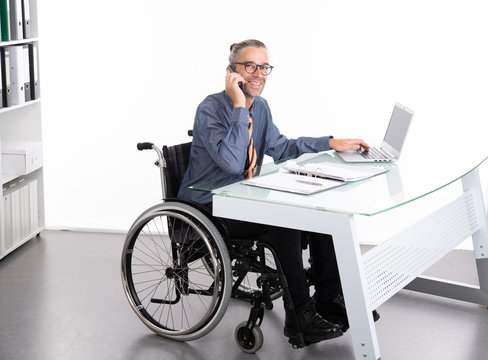 Disabled Business Man In Wheelchair