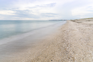 The beauty of the sandy beach on the spit between Pomorie and Aheloy. Pomorie lake. Pomorie spit. Bulgaria