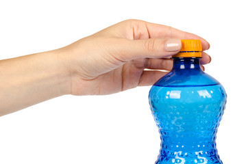 Blue plastic water bottle with orange cap, isolated on white background, with hand