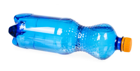 Blue plastic water bottle with orange cap, isolated on white background