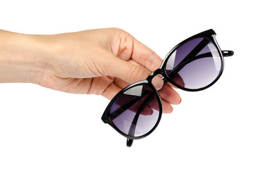 Stylish plastic sunglasses with hand isolated on white background