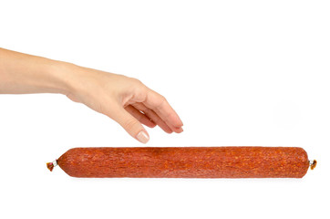 smoked salami sausage piece with hand, isolated on white background