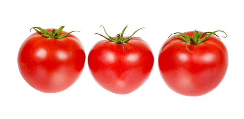 Fresh whole raw red tomato with green leaf, isolated on white background