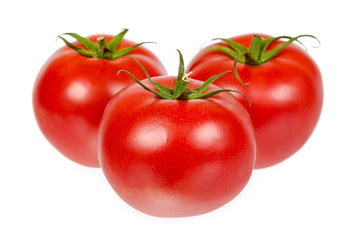 Fresh whole raw red tomato with green leaf, isolated on white background