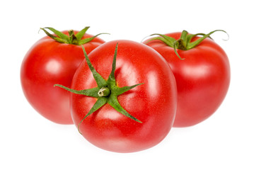 Fresh whole raw red tomato with green leaf, isolated on white background