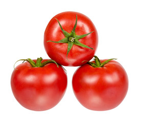 Fresh whole raw red tomato with green leaf, isolated on white background