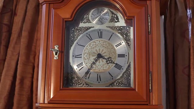 Old wooden clock with pendulum, Old wooden clock with a pendulum, antique wooden clock with a pendulum