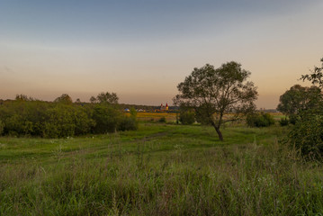 Obraz premium Magic landscape is evening, sunset over the field.
