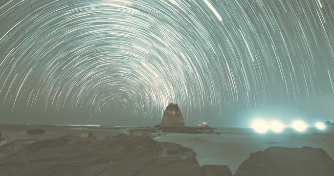 Papuma beach night sky star trail time lapse video clip, Indonesia