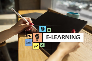 E-Learning on the virtual screen. Internet education concept.