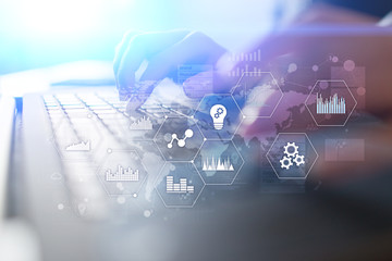 Applications icons and graphs on virtual screen. Business, internet and technology concept.