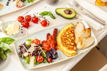 The concept of an Italian breakfast. omelette and salad. background image. Copy space, selective focus