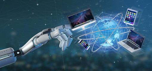 Obraz na płótnie Canvas Cyborg hand holding a Computer and devices displayed on a futuristic interface with international network - 3d rendering