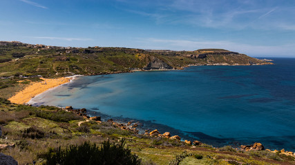 Fototapeta na wymiar Ramla Bay as seen from Mixta Cave in Gozo