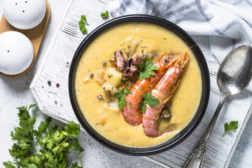 Chowder soup with seafood and prawn shrimps.