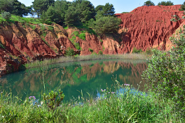 Italy, Otranto,   pond of the ancient bauxite quarry. View and details