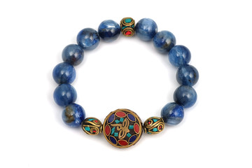 Kyanite or Cyanite blue lucky stone bracelet bead decorate with Chakra amulet accessories on white isolated background
