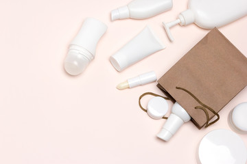 Cosmetic products with paper merchandise bag, copy space