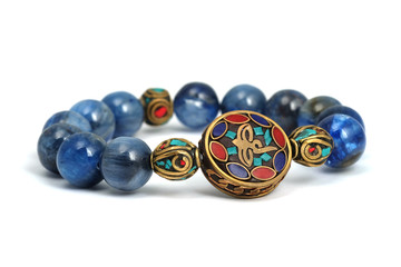 Kyanite or Cyanite lucky stone bracelet bead decorate with Chakra amulet accessories on white...