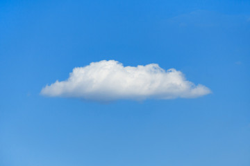 Alone cloud in the clear blue sky (concept, background)