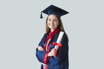 Young female student graduating from university