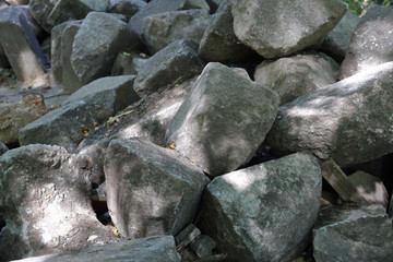 Pile of large gray cobblestones for landscape design
