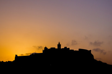 City of Victoria in Gozo, Malta in Europe. View over the city on the cathedral of Victoria in the sunset time