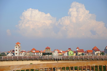 Clouds and houses at sunset in Hanoi, Vietnam