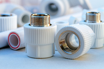 Combination coupling for polypropylene pipes