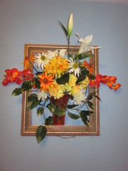 Painting with vase and artificial flowers. 